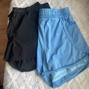 Two pair of athletic shorts both mediums